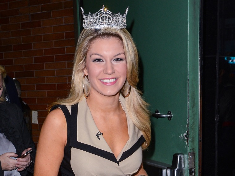 Miss America 2013 Mallory Hagan stepped out in a Joseph Ribkoff design after her win.