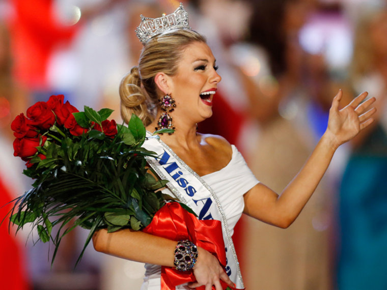 In dazzling gowns and sexy bikinis, 53 contestants competed for the pageant's coveted crown.