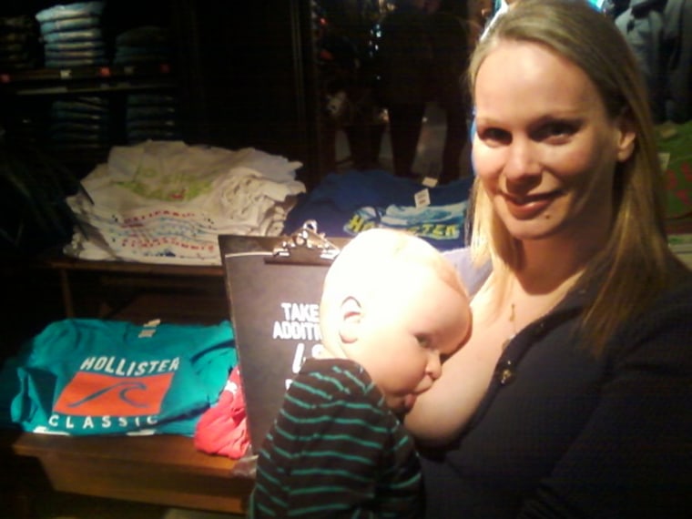 Abby Theuring nurses her son Jack, 17 months, at a pro-breast-feeding protest at a Hollister store in Skokie, Ill.
