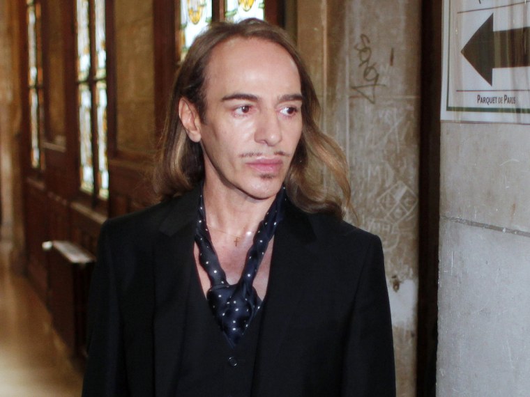 Former Dior designer John Galliano is pictured arriving at a Paris court house on June 22, 2011 after being charged with hurling anti-Semitic slurs in a Paris cafe. Galliano is spending the next three weeks with Oscar de la Renta in preparation for a comeback with a New York Fashion Week show.