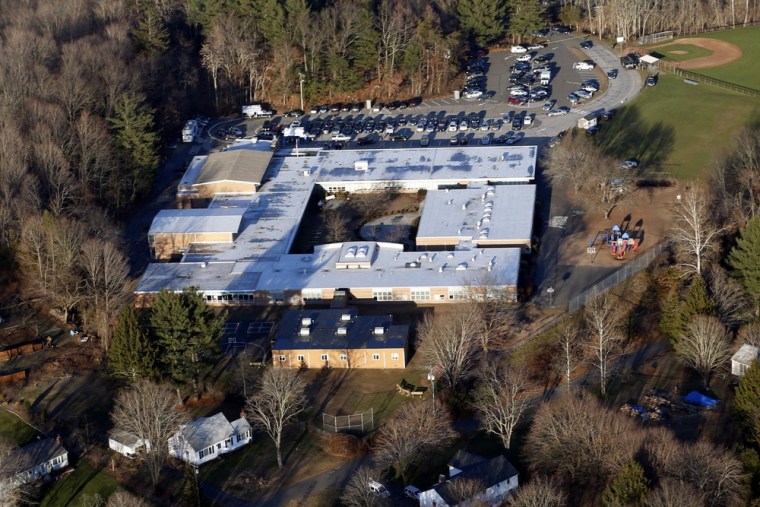This aerial photo shows Sandy Hook Elementary School in Newtown, Conn., the site of the Dec. 14 shooting that left 20 children and six staffers dead. As residents weigh in on the future of the building, students are attending school at a different facility.