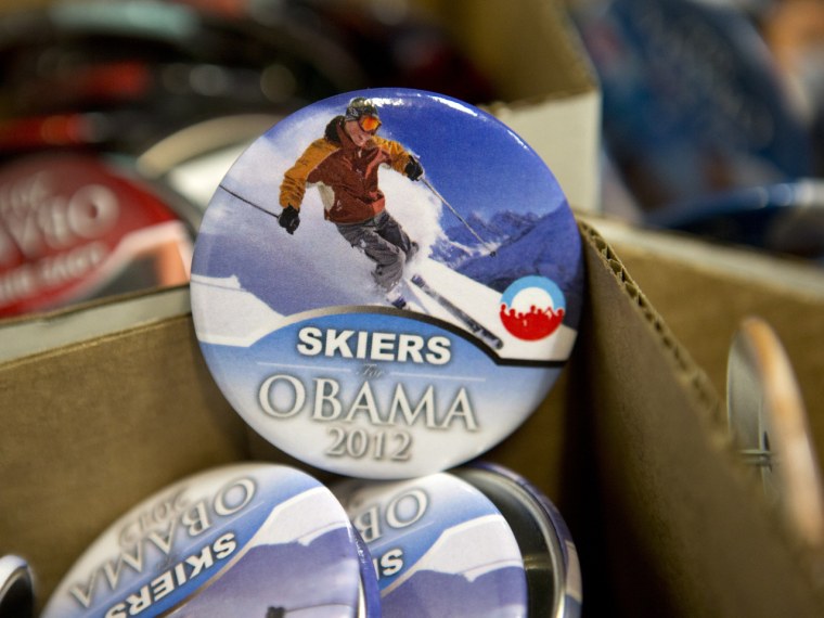 A large variety of pins, including \"Skiers for Obama 2012,\" are for sale among the inauguration memorabilia at the PIC store.