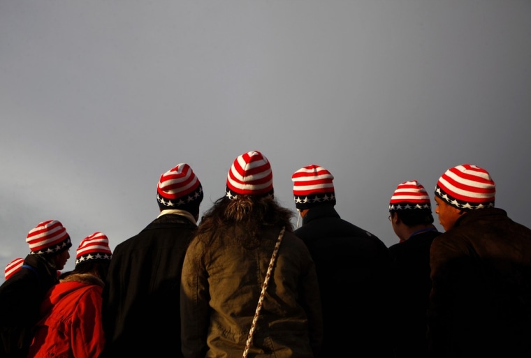 Spectators are seen before the inauguration of President Barack Obama, in Washington D.C.