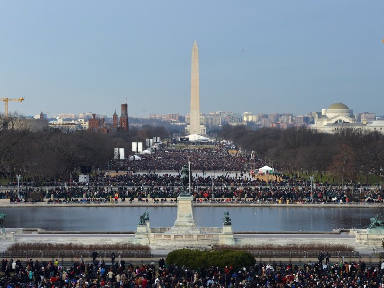 People crowd the National Mall ahead of President Barack Obama's inauguration ceremony at the US Capitol on January 21, 2013 in Washington, D.C.