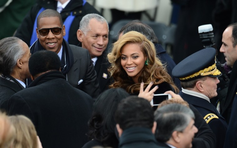 Singer Beyoncé and husband Jay Z arrive for the 57th Presidential Inauguration ceremonial swearing-in.