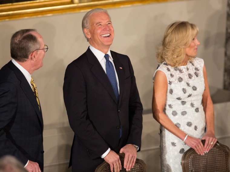 Biden has a laugh with Senator Lamar Alexander and his wife, Dr. Jill Biden, at the Inaugural Luncheon in Statuary Hall on Monday.