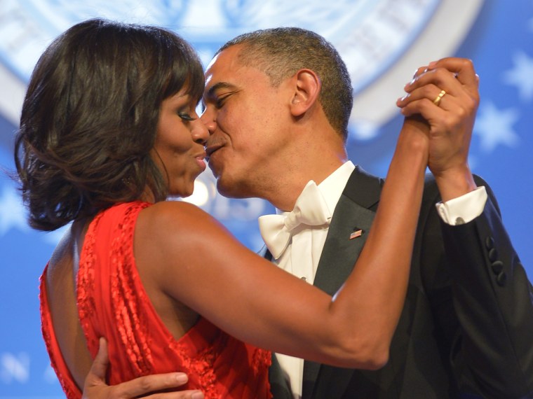 A kiss to build a dream on: President Barack Obama and first lady Michelle Obama puckered up while dancing at the Inaugural Ball on Monday night in Washington, D.C.
