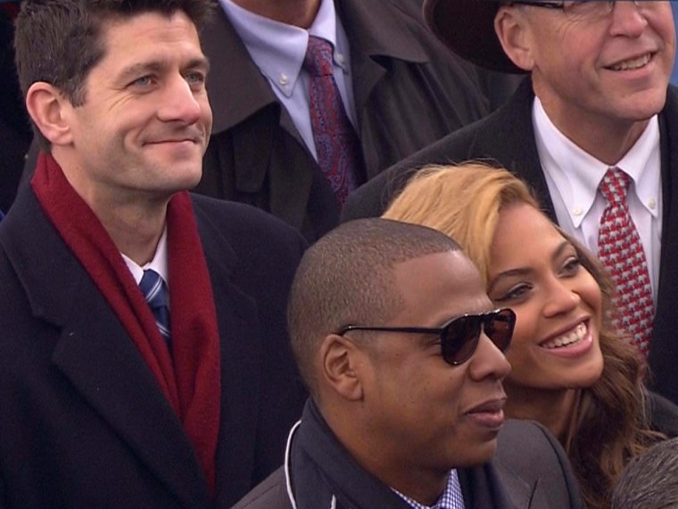 Celebs go first? Beyonce and Jay-Z leave the inauguration viewing area ahead of Congressman and former VP nominee Paul Ryan.