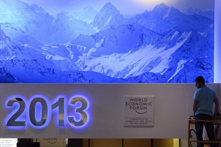 A worker makes the last preparations Monday before the opening of the 43rd Annual Meeting of the World Economic Forum in Davos, Switzerland, where Ban Ki-moon, other world leaders and business people will meet.