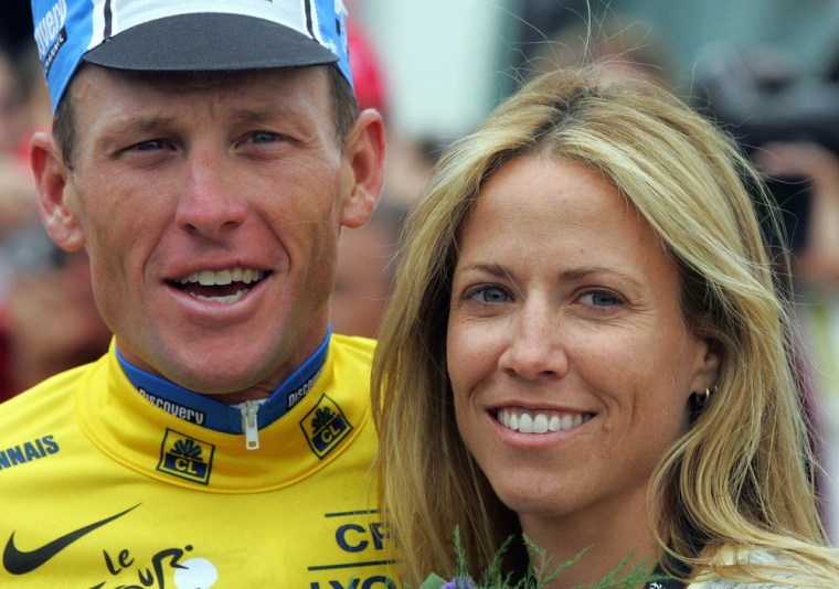 Lance Armstrong and Sheryl Crow pose after the fourth stage of the 92nd Tour de France on July 5, 2005.