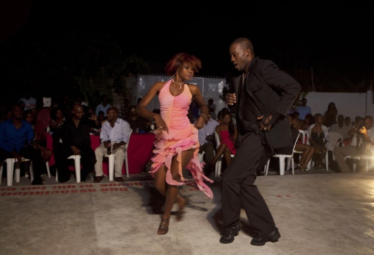 Professional dancer Georges Exantus, right, performs with Modeline Gene Arhan during a show in Port-au-Prince.