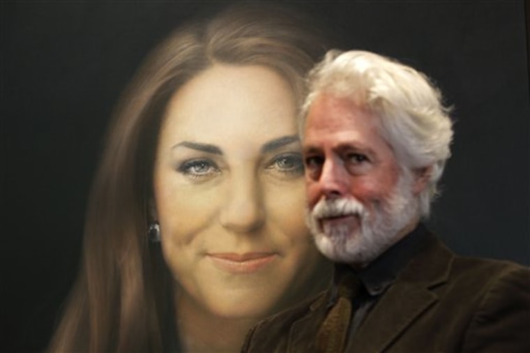 Artist Paul Emsley poses next to his portrait of Kate, Duchess of Cambridge, on display at the National Portrait Gallery in London, Friday, Jan. 11, 2013.