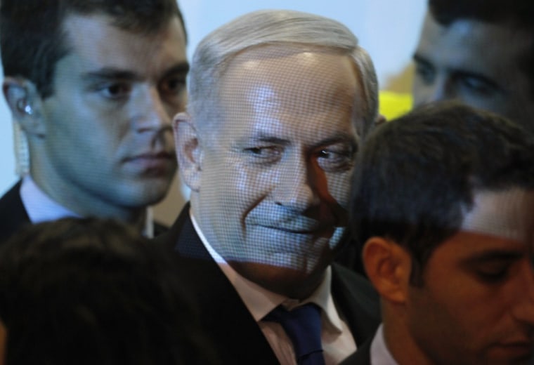 Israeli Prime Minister Benjamin Netanyahu leaves the Likud-Yisrael Beitenu headquarters in Tel Aviv on Wednesday.