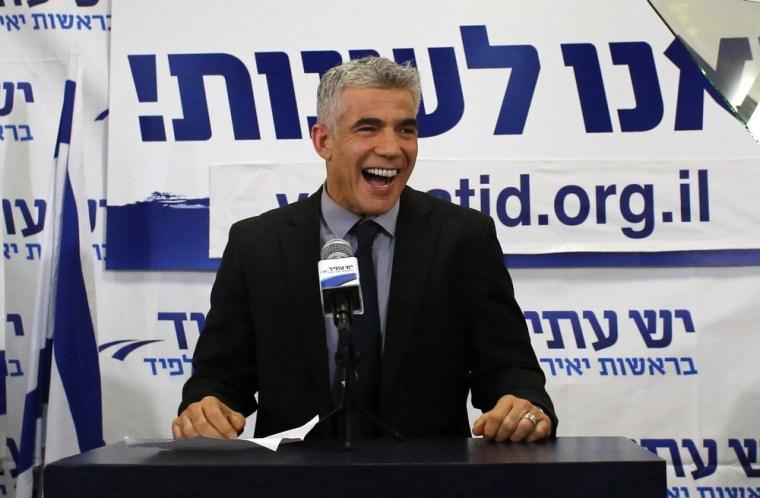 Yair Lapid, leader of the Yesh Atid (There is a Future) party, addresses supporters at his party's headquarters in Tel Aviv on Wednesday. The surprise star of Israel's election is a former television news anchor whose centrist party soared to second place in the balloting.