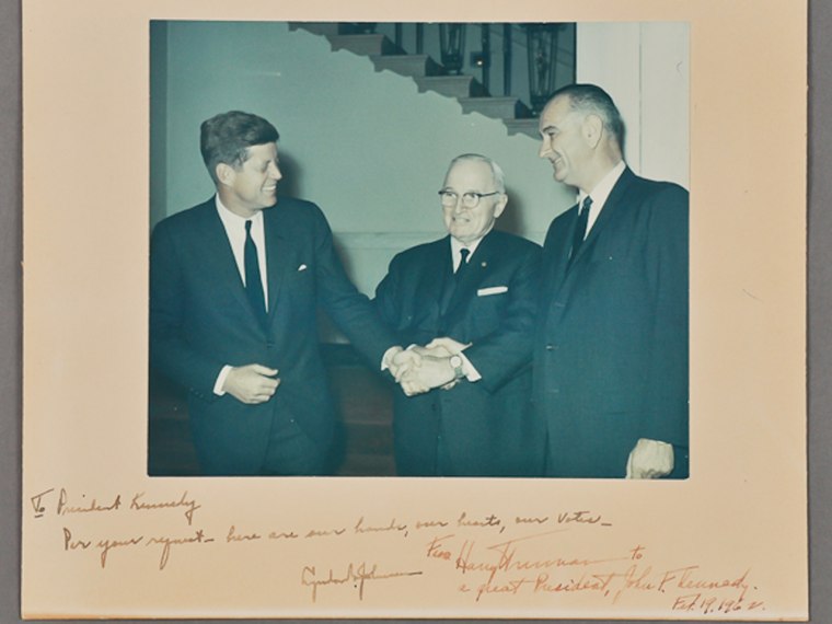 This photo from 1962 features three presidents - John F. Kennedy, Lyndon Johnson and Harry Truman. Johnson and Truman each signed it with personal messages for Kennedy.