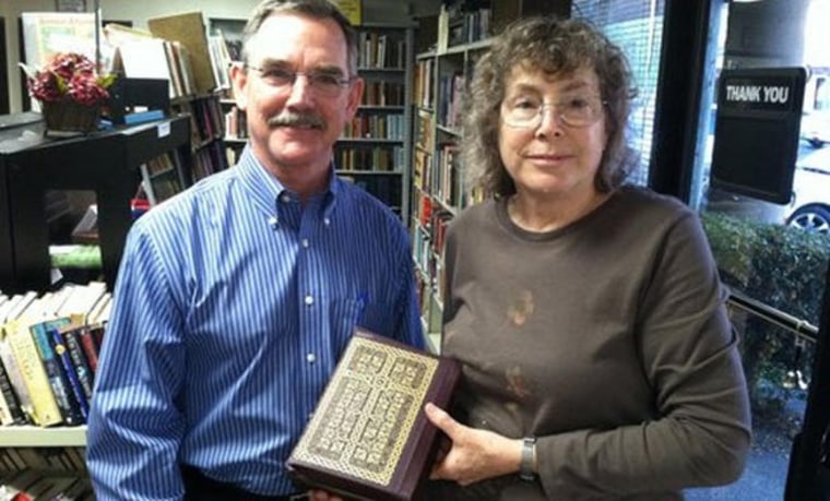 Joanne Murphy, right, is a library booster and former emergency room physician who realized that an old Bible had belonged to baseball great Branch Rickey, who broke the color barrier by hiring Jackie Robinson for the then-Brooklyn Dodgers. At left, Rickey's grandson, Christopher Jakle.