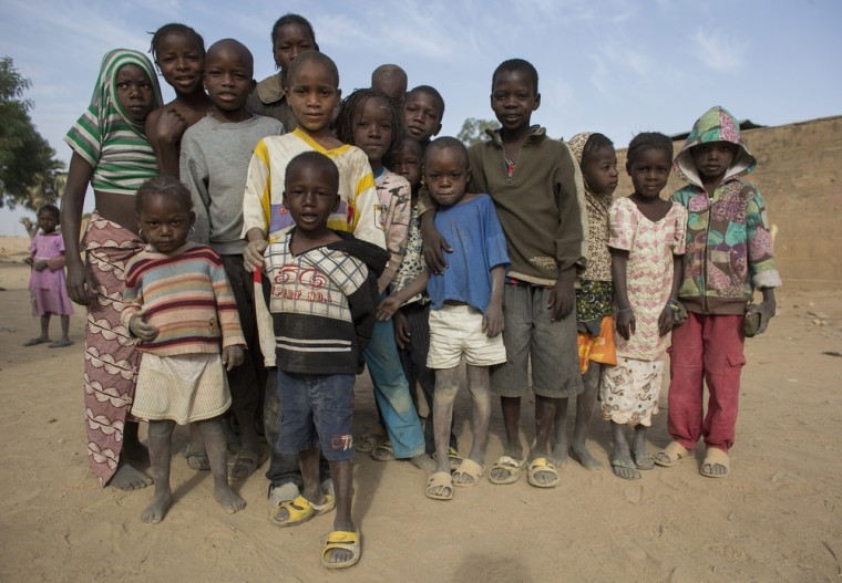 Children living in Diabaly, Mali pose for a photograph on Jan. 26.