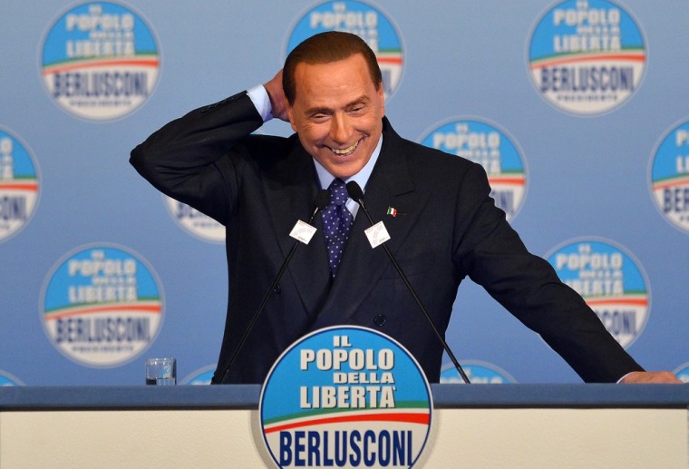 Italy's former Prime Minister Silvio Berlusconi, seen giving a speech during a campaign rally in Rome Friday, appears to have shrugged off recent scandals.