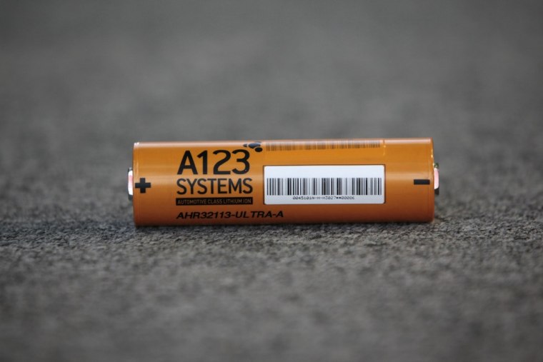In this Thursday, Aug. 6, 2009, file photo, an A123 Systems Inc. high power Nanophospate Lithium Ion Cell for Hybrid Electric Vehicles battery is disp...