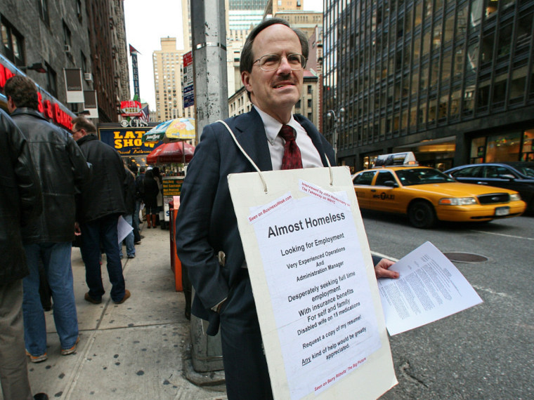 In this file photo of Nov. 18,  2008, Paul Nawrocki looks for work in New York City wearing a sandwich board reading \"Almost Homeless.'' Nawrocki found a job, but two years later he was still worried about his economic stability.