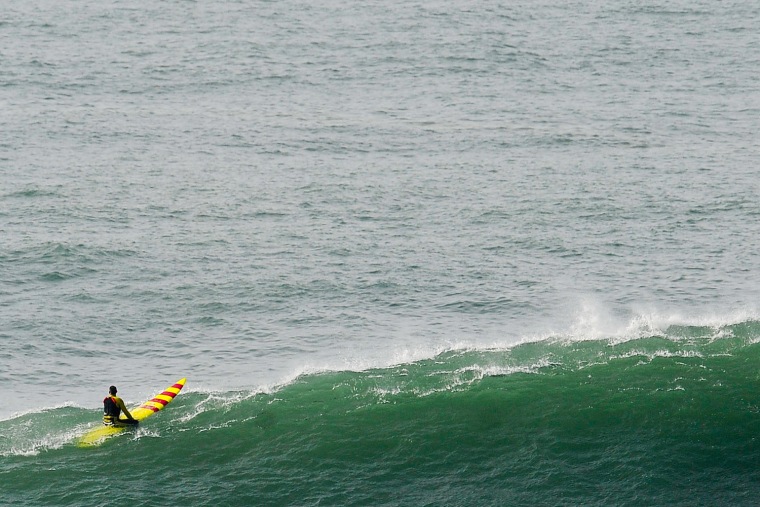 Garrett McNamara waits for a wave during a surf session at Praia do Norte in Nazare on Jan. 30.
