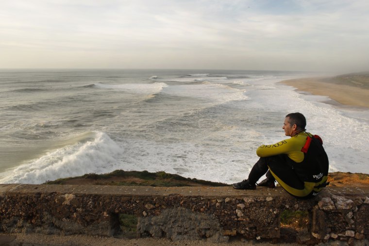 Garrett McNamara rests after a surf session at Praia do Norte beach in Nazare, Portugal, on Jan. 29.