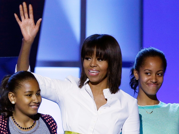 The first lady looks as sophisticated in designer dresses as she does in outfits from J. Crew.