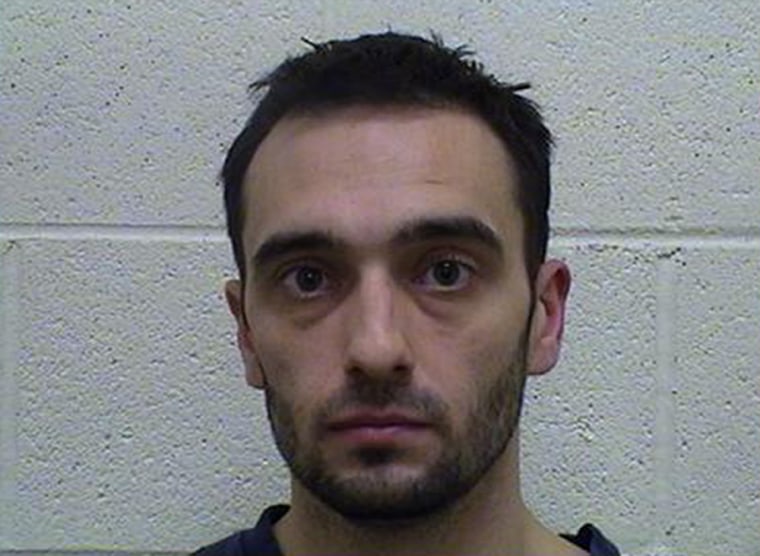 Dennis Robinson, 28, is accused of smoking crack cocaine inside his SUV with his 2-year-old twins in the back seat.