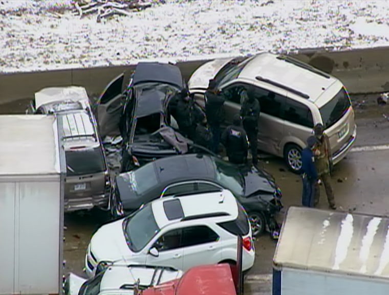 Dozens of cars and trucks were involved in a pile up on I-75 in Michigan on Thursday.