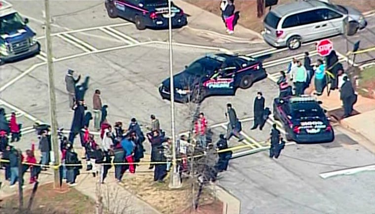 Scene outside a shooting at Price Middle School in Atlanta, Ga., on Thursday, Jan. 31, 2013.