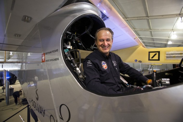 Andre Borschberg, one of two pilots of the Solar Impulse plane, poses for a portrait in the cockpit of the purely solar-powered plane at the Smithsoni...