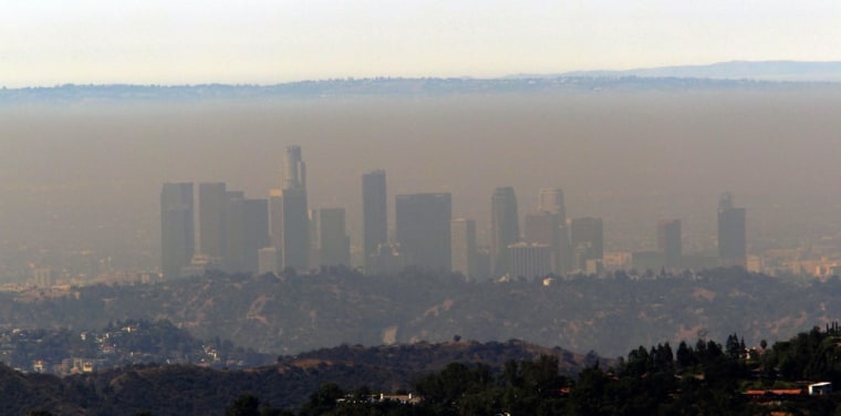 A thick band of haze shrouds downtown Los Angeles on Monday July 9, 2012. Forecasters warned that heat, combined with very low humidity levels, will e...