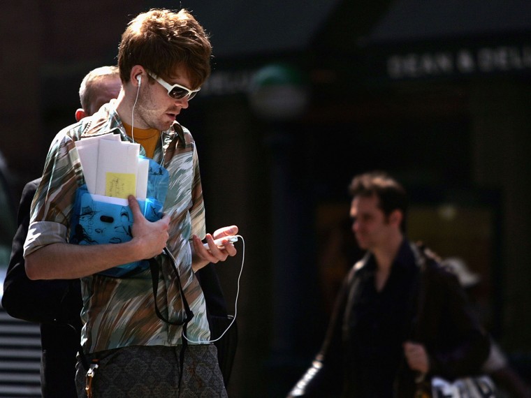 A man holds an Apple iPod 5 in New York City.