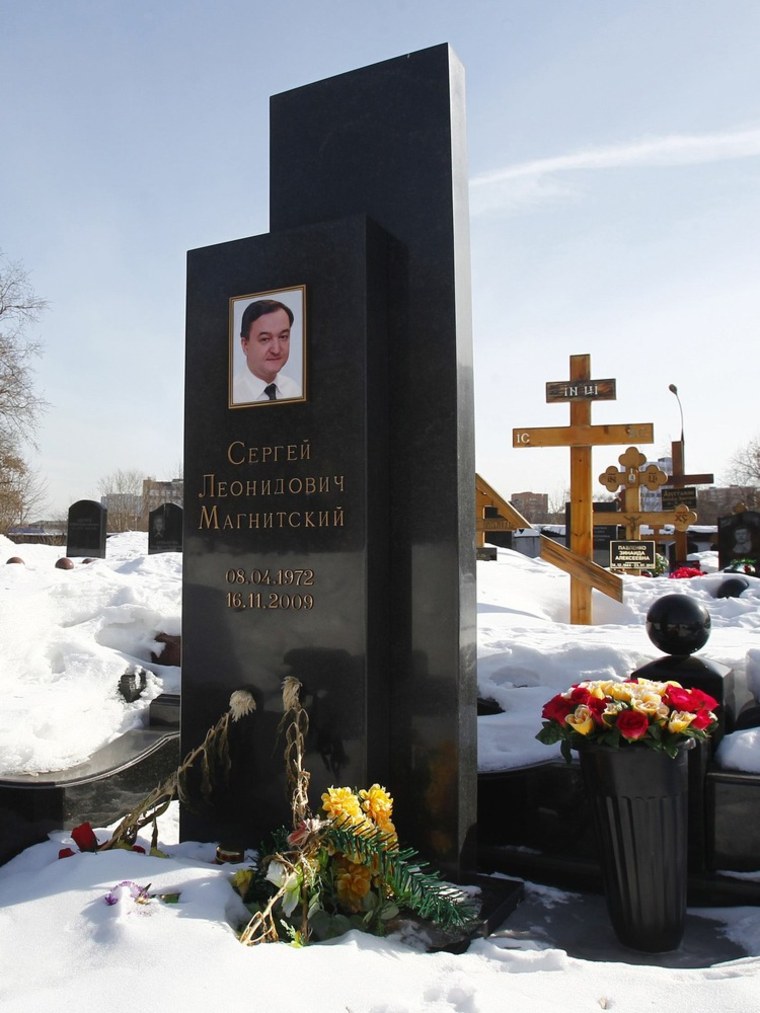 Flowers lie near the grave of lawyer Sergei Magnitsky in Moscow on March 11.