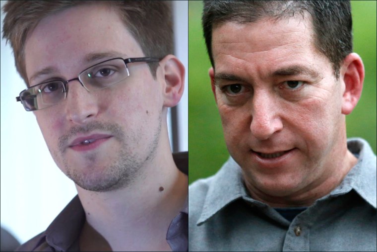 A file video grab courtesy of the British newspaper The Guardian shows former CIA employee Edward Snowden during an exclusive interview with the newspaper's Glenn Greenwald and Laura Poitras in Hong Kong.