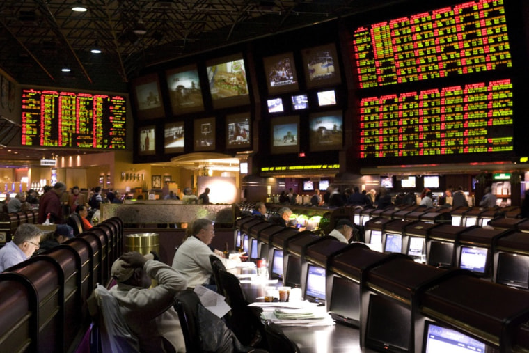 Proposition bets for Super Bowl XLV are posted at the race and sports book in the Las Vegas Hilton in Las Vegas in January 2011.