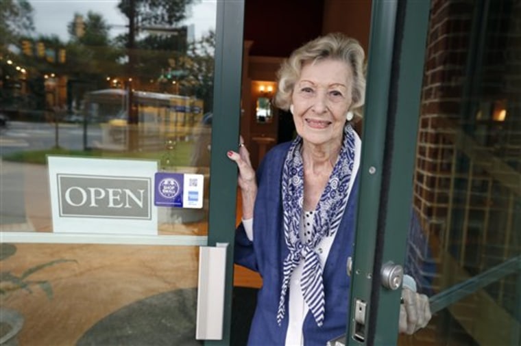 June Springer, poses for a photograph, where she works at Caffi Contracting Services, Friday, July 12, 2013 in Alexandria, Va. Springer who just turne...