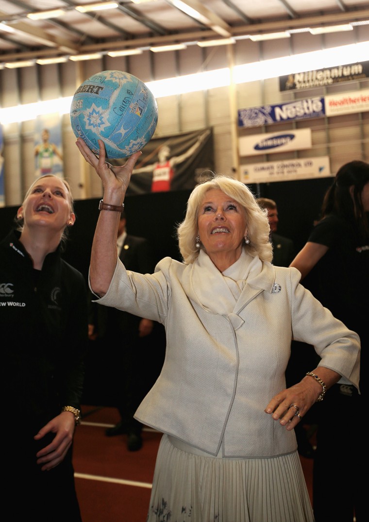 Image: Camilla attempts a netball shot with Katrina Grant, left, of the New Zealand Silver Ferns netball team in Auckland, New Zealand on Nov. 12, 2012.