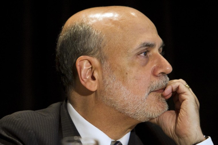 Federal Reserve Chairman Ben Bernanke attends a meeting of the National Bureau of Economic Research in Cambridge, Massachusetts in this July 10, 2013 ...