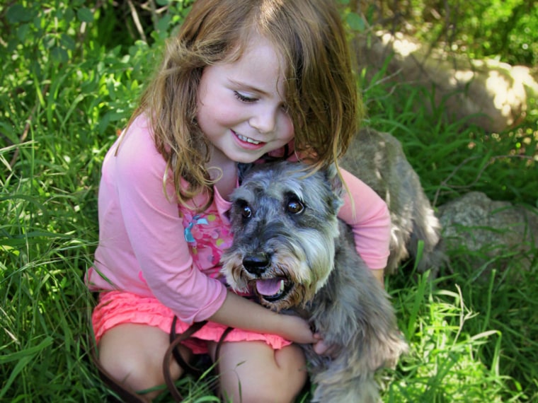 Image: Potter the dog with little girl