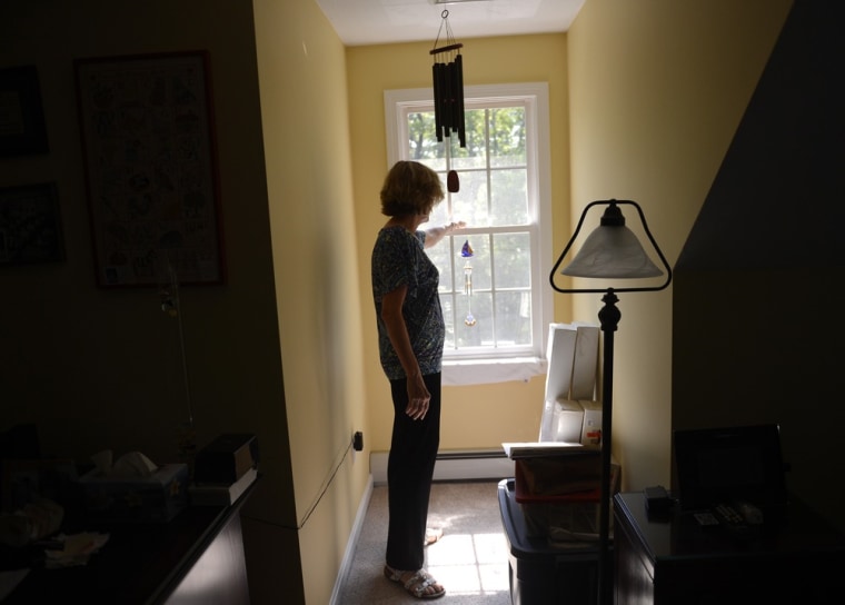 Joyce Botti, 60, a former school teacher at her home in Bourne, Mass., Wed., July 17, 2013. Gretchen Ertl for NBC.com