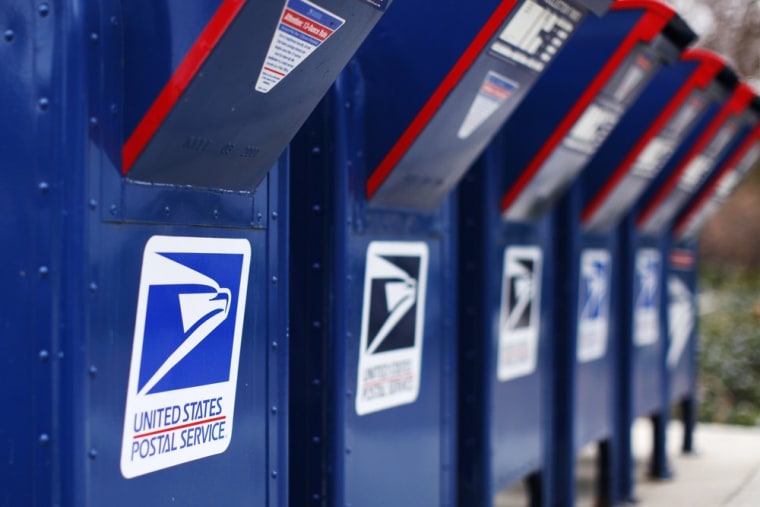 A view shows U.S. postal service mail boxes at a post office in Encinitas, California in this February 6, 2013 file photo.