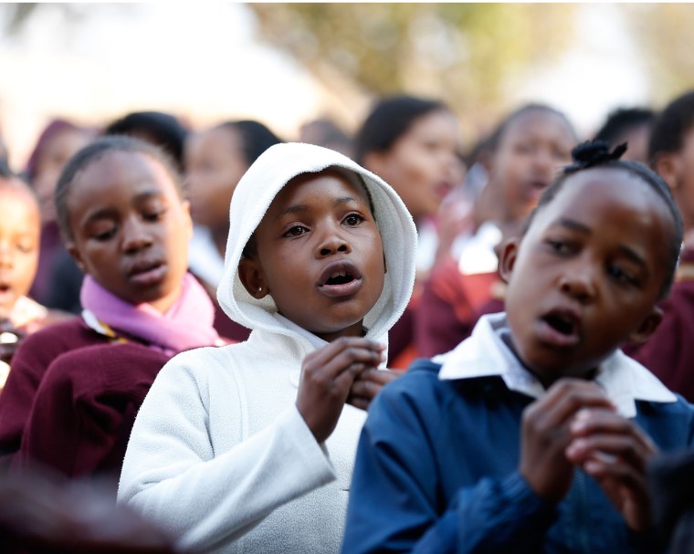 Children from the Vukazenele Higher Primary School in the Mofolo North Neighborhood of Soweto sing for Nelson Mandela's birthday on July 18 in Johannesburg. Children in schools across the country were called upon to sing