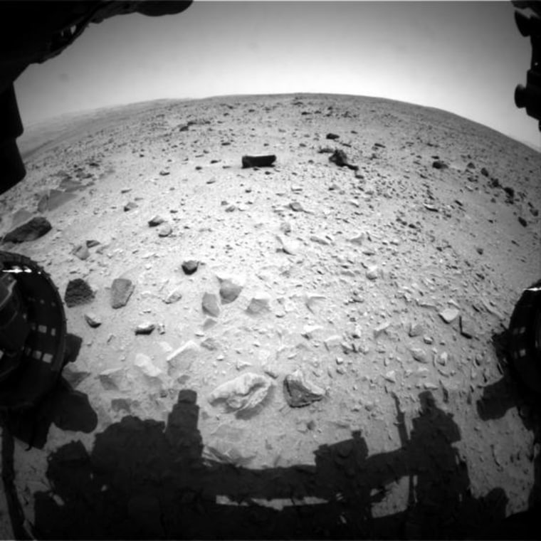 NASA's Curiosity Mars rover captured this image with its left front Hazard-Avoidance Camera (Hazcam) just after completing a drive that took the mission's total driving distance past the 1 kilometer (0.62 mile) mark. Image released July 17, 2013.