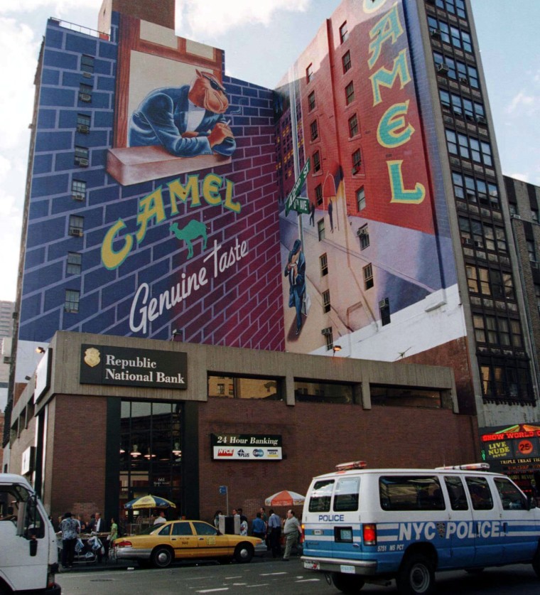 The RJ Reynolds Tobacco Co. said July 10 that it will retire the controversial Joe Camel advertising character seen here on the side of a building in ...