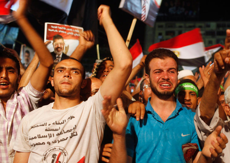 Supporters of deposed Egyptian President Mohammed Morsi chant slogans during a rally on Thursday.