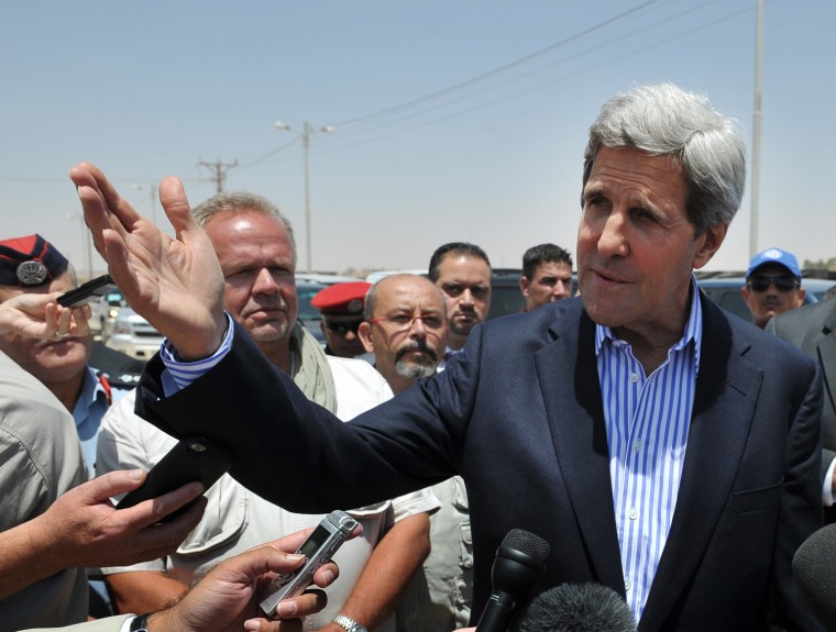 Secretary of State John Kerry speaks to reporters during a visit at the Zaatari refugee camp in Mafraq, Jordan on Thursday.