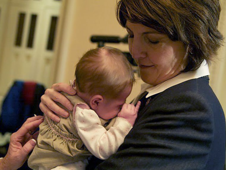 Image: Rep. Rodgers with her second child, daughter Grace.