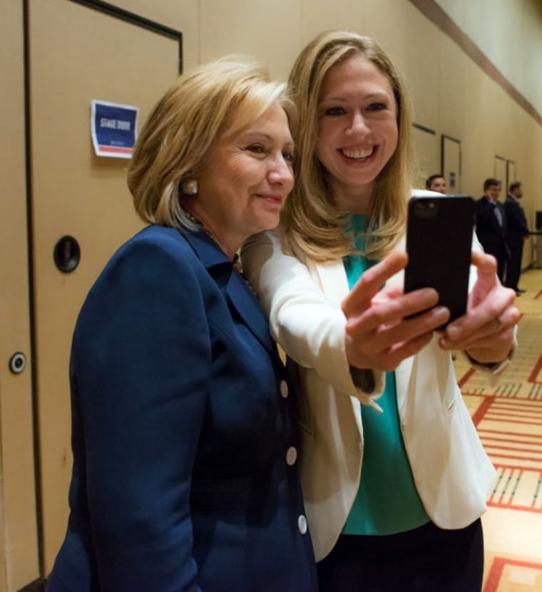 This June 14, 2013 photo released by Barbara Kinney shows former Secretary of State Hillary Rodham Clinton, left, posing with her daughter Chelsea at ...