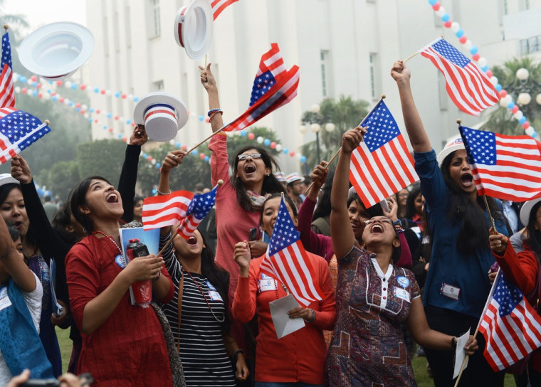 Indian university students celebrate after hearing that President Barrack Obama had been re-elected during an election party at a hotel in Delhi on November 7, 2012.